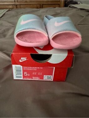 Nike Kids Slides in Pink and Light Blue with White Swoosh